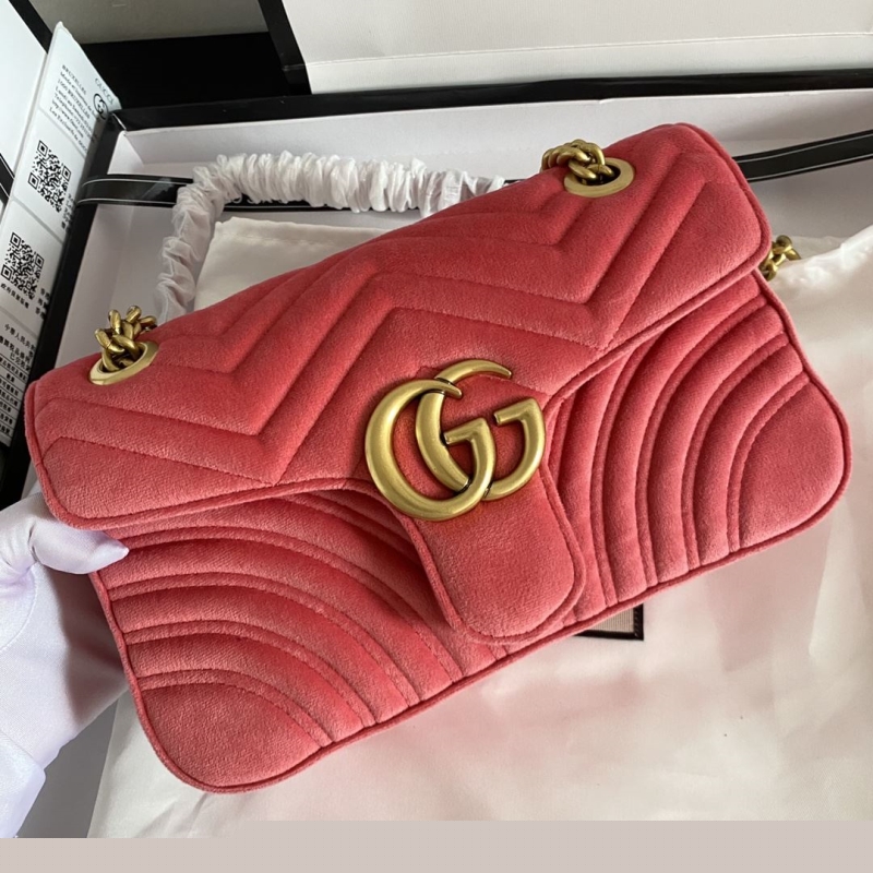 G*u*i clutch bags